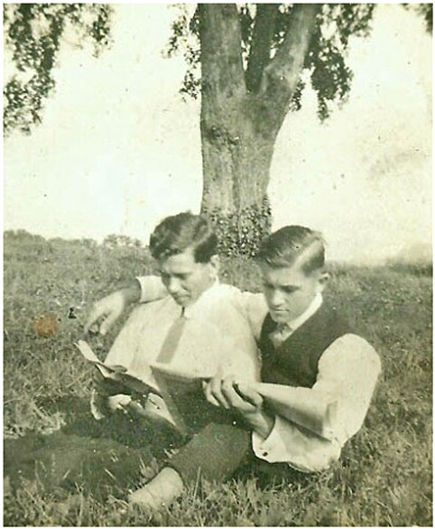 gay-men-reading-under-tree